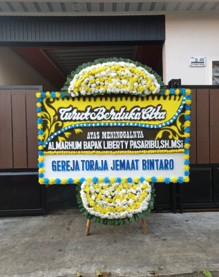 Papan Bunga Duka di Lokwirin